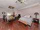 Large main bedroom with hardwood floors and sitting area at 321 Pedro St, Venice, FL 34285