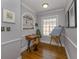 Home office with hardwood floors and built-in shelves at 321 Pedro St, Venice, FL 34285