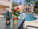 Enjoy champagne by the pool with this relaxing view at 321 Pedro St, Venice, FL 34285