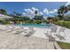 Enjoy the sun by the community pool with lounge chairs at 335 Englewood Isles Pkwy # 55, Englewood, FL 34223