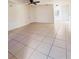 Spacious living room featuring tile floors and an open layout at 3400 Rain Lily, Englewood, FL 34224