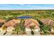 Community of villas with golf course and pond views at 4259 Whispering Oaks Dr, North Port, FL 34287