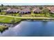 Aerial view of house situated on the golf course at 4259 Whispering Oaks Dr, North Port, FL 34287