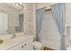 Clean bathroom with a tub shower combination at 4259 Whispering Oaks Dr, North Port, FL 34287
