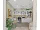 Bright home office featuring built-in shelving and workspace at 4259 Whispering Oaks Dr, North Port, FL 34287