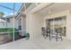 Relaxing screened patio with seating area, perfect for outdoor enjoyment at 4259 Whispering Oaks Dr, North Port, FL 34287