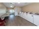 Well-equipped community laundry room with multiple washers and dryers at 43 Crown Point Dr, Nokomis, FL 34275