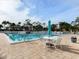 Refreshing community pool with patio furniture at 43 Crown Point Dr, Nokomis, FL 34275