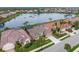 Luxury homes surround a lake in a peaceful community at 430 Marsh Creek Rd, Venice, FL 34292