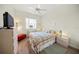 Guest bedroom with a queen-size bed and plenty of closet space at 430 Marsh Creek Rd, Venice, FL 34292