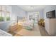 Comfortable bedroom with a king-size bed and plenty of natural light at 430 Marsh Creek Rd, Venice, FL 34292