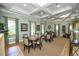 Bright and airy community room with ample seating at 430 Marsh Creek Rd, Venice, FL 34292