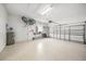Spacious garage with ample storage and epoxy flooring at 430 Marsh Creek Rd, Venice, FL 34292
