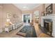 Living room features a fireplace, recessed lighting, and access to the backyard at 430 Marsh Creek Rd, Venice, FL 34292