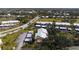 Aerial view of community, showcasing homes, landscaping, and parking at 458 Cerromar Rd # 483, Venice, FL 34293
