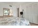 Bedroom with floral bedding and built in closet at 458 Cerromar Rd # 483, Venice, FL 34293