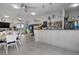 Bright clubhouse bar with seating and a full service bar at 458 Cerromar Rd # 483, Venice, FL 34293