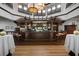 Large clubhouse bar with a view, high-top seating, and full bar at 458 Cerromar Rd # 483, Venice, FL 34293