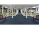 Covered walkway leading to community clubhouse at 458 Cerromar Rd # 483, Venice, FL 34293
