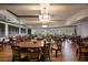 Clubhouse dining room with tables and chairs at 458 Cerromar Rd # 483, Venice, FL 34293