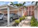 Condo building exterior showing walkway and carport at 458 Cerromar Rd # 483, Venice, FL 34293