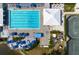 Large community lap pool with surrounding deck and lounge chairs at 458 Cerromar Rd # 483, Venice, FL 34293