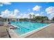 Large resort-style pool with plenty of lounge chairs at 458 Cerromar Rd # 483, Venice, FL 34293