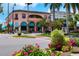 Quaint street view with shops and flowers at 458 Cerromar Rd # 483, Venice, FL 34293