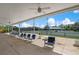 Covered patio area overlooking tennis courts at 458 Cerromar Rd # 483, Venice, FL 34293