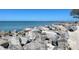 Rocky shoreline with ocean view at 460 Base E Ave # 122, Venice, FL 34285