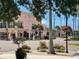 Quaint street view with shops and pedestrians at 460 Base E Ave # 122, Venice, FL 34285