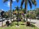 Landscaped median with hanging flower baskets at 460 Base E Ave # 122, Venice, FL 34285