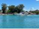 Boat on calm waterway at 460 Base E Ave # 122, Venice, FL 34285