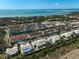 Aerial view of community showing homes, pools, and waterfront access at 4713 61St Avenue W Dr, Bradenton, FL 34210