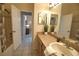 Bathroom with single sink and shower/tub combo at 4940 Thames Ln, Sarasota, FL 34238
