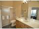 Bathroom with shower and single vanity at 4940 Thames Ln, Sarasota, FL 34238