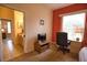 Bedroom with desk, chair, and TV at 4940 Thames Ln, Sarasota, FL 34238