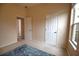 Bedroom with two closets and a view at 4940 Thames Ln, Sarasota, FL 34238