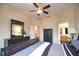 Spacious bedroom with a dresser and large mirror at 4940 Thames Ln, Sarasota, FL 34238