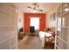 Bright bedroom with daybed and french doors at 4940 Thames Ln, Sarasota, FL 34238