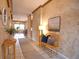 Inviting entryway with wood bench and decorative wall at 4940 Thames Ln, Sarasota, FL 34238