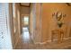 Hallway with tile flooring and access to bedrooms at 4940 Thames Ln, Sarasota, FL 34238