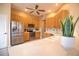 Modern kitchen with stainless steel appliances and light wood cabinets at 4940 Thames Ln, Sarasota, FL 34238