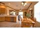 Kitchen with breakfast nook and view into the living room at 4940 Thames Ln, Sarasota, FL 34238