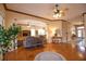 Open living room with hardwood floors, high ceilings and lots of natural light at 4940 Thames Ln, Sarasota, FL 34238
