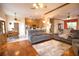 Open concept living room and kitchen with hardwood floors at 4940 Thames Ln, Sarasota, FL 34238