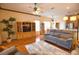 Living room with hardwood floors and built-in entertainment center at 4940 Thames Ln, Sarasota, FL 34238