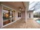 Covered patio overlooking the pool and spa at 4940 Thames Ln, Sarasota, FL 34238