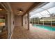 Relaxing pool area with covered patio and spa at 4940 Thames Ln, Sarasota, FL 34238