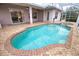 Large, inviting pool with brick coping at 4940 Thames Ln, Sarasota, FL 34238